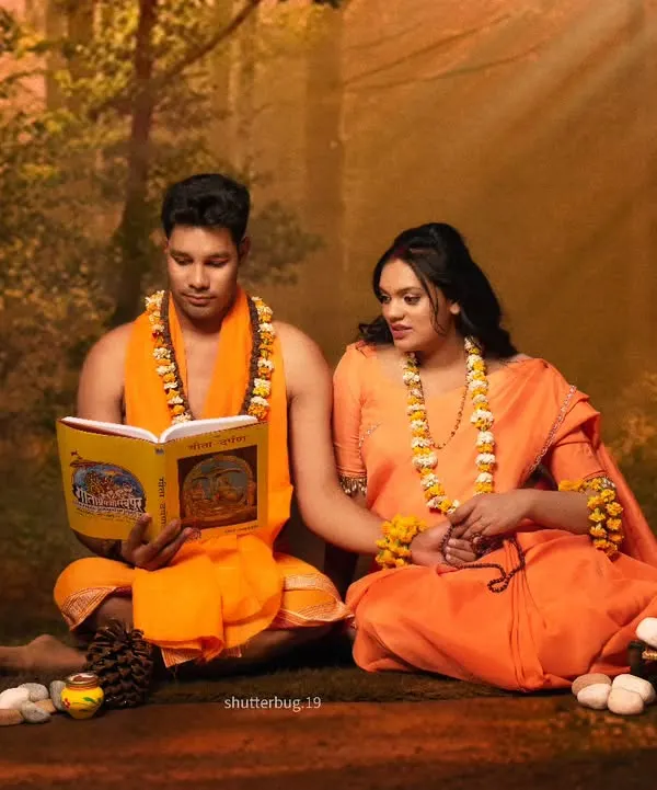 Our highly stylized Ram Sita themed maternity shoot. We created a serene forest setting in our studio for this couple, capturing a moment of them reading scriptures together, embodying peace and tradition.