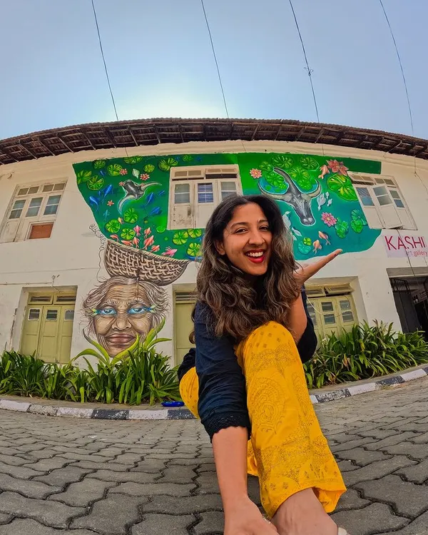 The finished mural in Fort Kochi, 'The Silver Eyes of Kochi'. It was an honor to paint this tribute to the local fisherwoman, whose spirit and hard work are the backbone of the community. Now, her story is woven into the fabric of this beautiful street.