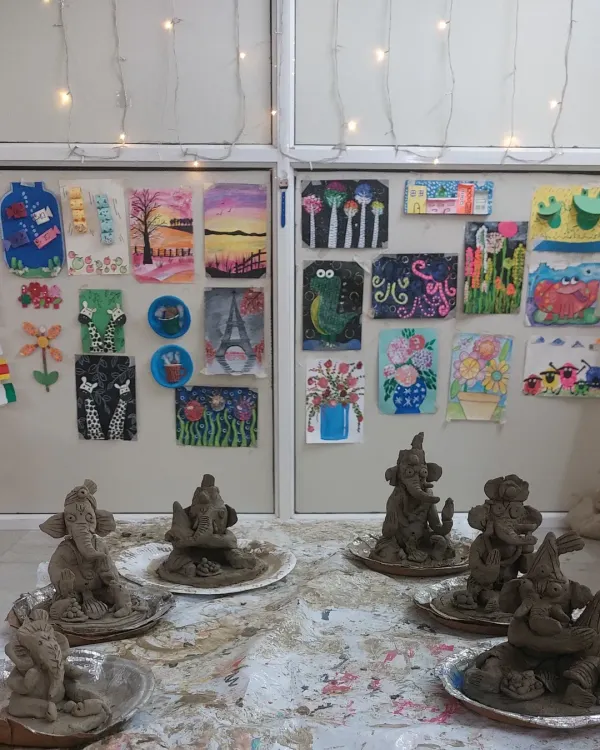A beautiful display of our handmade Ganesha idols, each one unique and crafted with love during our workshop. The fairy lights add a little magic to the finished creations.