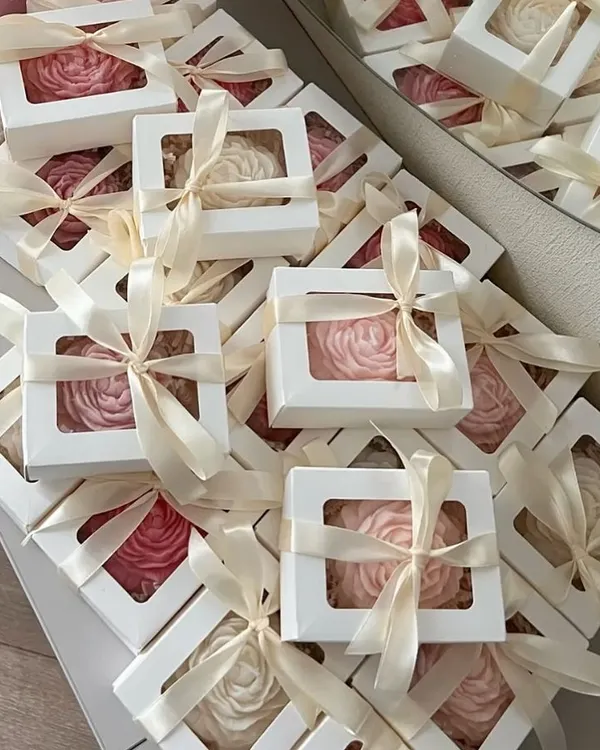 Peony-shaped candles are trending for baby shower orders. For this client, we customized them in a lovely baby pink, packed in simple white window boxes, and had them ready in just 4 days.