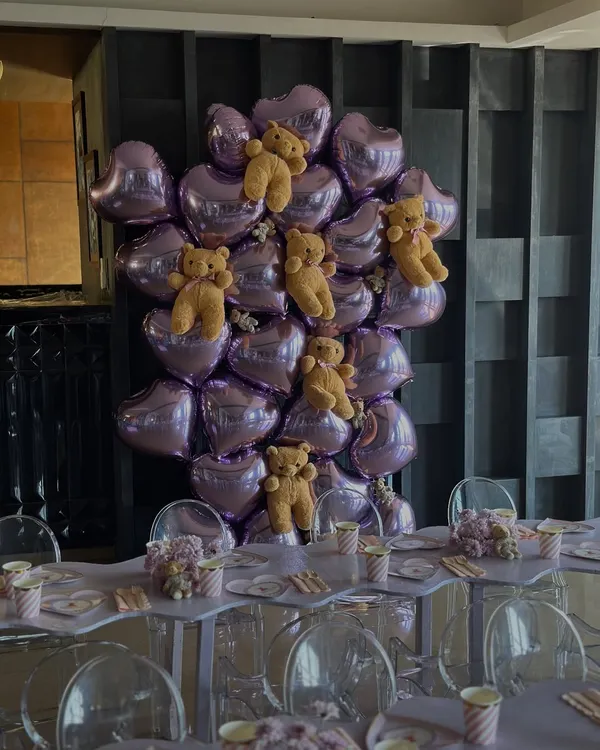 For Leila's 2nd birthday, I created this unique backdrop using metallic lavender heart balloons and adorable teddy bears for a sweet and modern look.