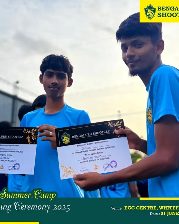 Two of our older participants receive their certificates at the closing ceremony of our 2025 Summer Camp at the ECC Centre, Whitefield.