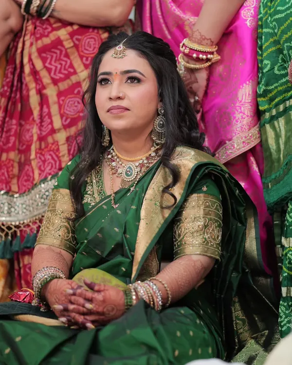 For her engagement, this bride wanted a soft, elegant, and flawless look. Dressed in a beautiful green saree, her makeup features subtle tones and a dreamy, timeless glow.