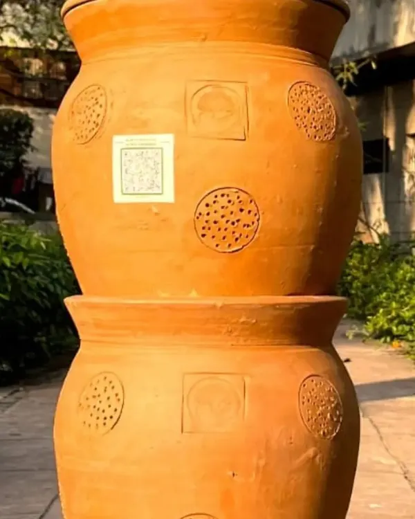 A close-up view of our stackable terracotta composter, showcasing the detailed craftsmanship and porous texture. Its compact and beautiful design makes it a perfect, functional addition to any home, balcony, or garden space.