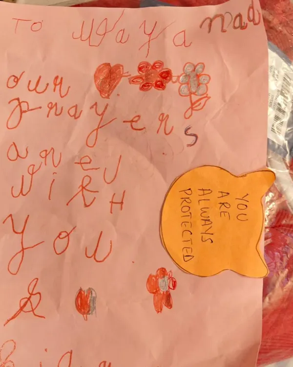 A heartfelt, handmade card from one of our children, included in a relief package for the people of Wayanad. This shows how empathy is woven into our community actions.