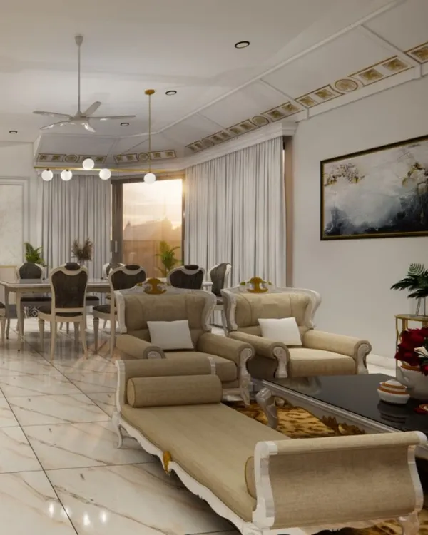 A wide-angle view of a grand living and dining room, designed for luxurious comfort and entertaining. The cohesive design features classic furniture silhouettes, elegant drapery, and intricate ceiling details, all unified by a polished marble floor.