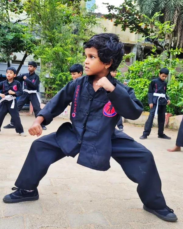 The focus and strong stance of this young girl are amazing. It is moments like these that show me some children are born with martial arts skills.