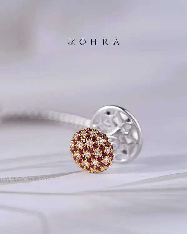 Confidence is also in having pieces made just for you. This is a close-up of my custom ruby and diamond cufflinks, crafted in white gold. From gemstone selection to the intricate backing, I shape every pair around your vision, so they are not just cufflinks, they are your cufflinks.