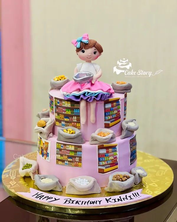 This cake was a special request for a girl who loves her family's grocery business. The two-tier design features edible prints of store shelves and handcrafted fondant sacks of grains.