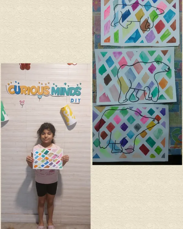 A proud student with her colorful cubism-inspired polar bear painting. Our Arctic Habitat session combined learning about geography with exploring different art styles, making the lesson multi-dimensional.