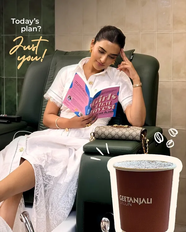 Your appointment is your time to recharge. Here, a client enjoys a relaxing pedicure while catching up on some reading. It's the perfect solo escape to unplug and focus on yourself.