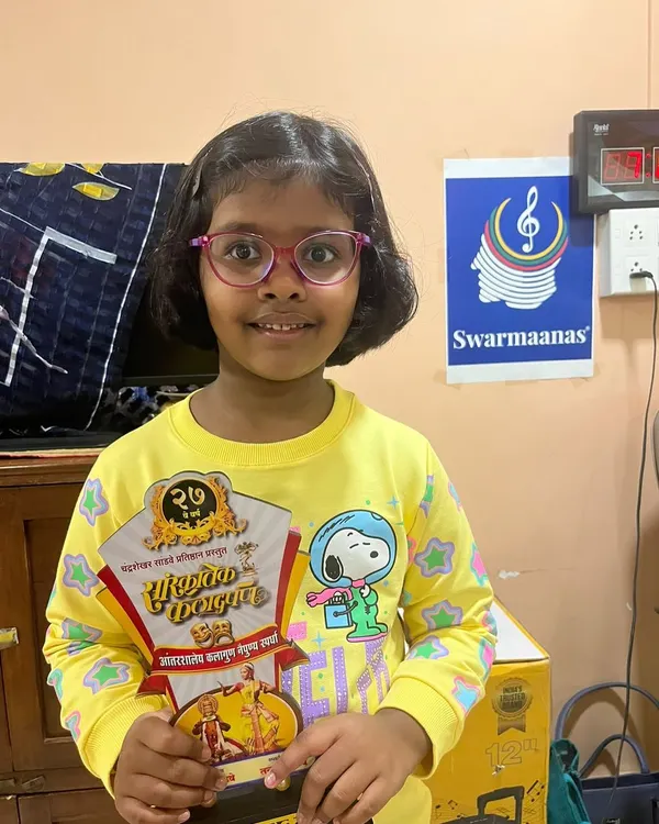 Here is my wonderful student Gatha, proudly holding her first prize trophy from a competition. A proud moment for all of us at Swarmaanas!
