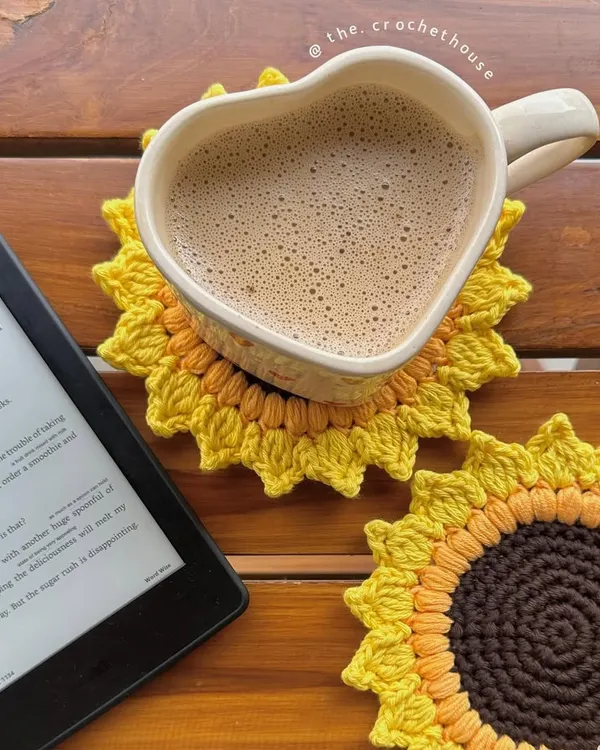 Start your morning with a smile with our handmade crochet sunflower coasters. They are the perfect size for your coffee mug and add a cheerful, pinterest-inspired touch to your desk or table.