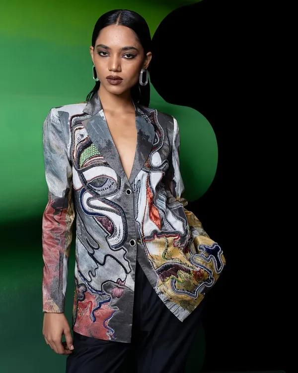 Creative direction and styling for designer Advait. This look features a hand-painted blazer, and I used a graphic green and black set to make the artwork on the jacket pop.