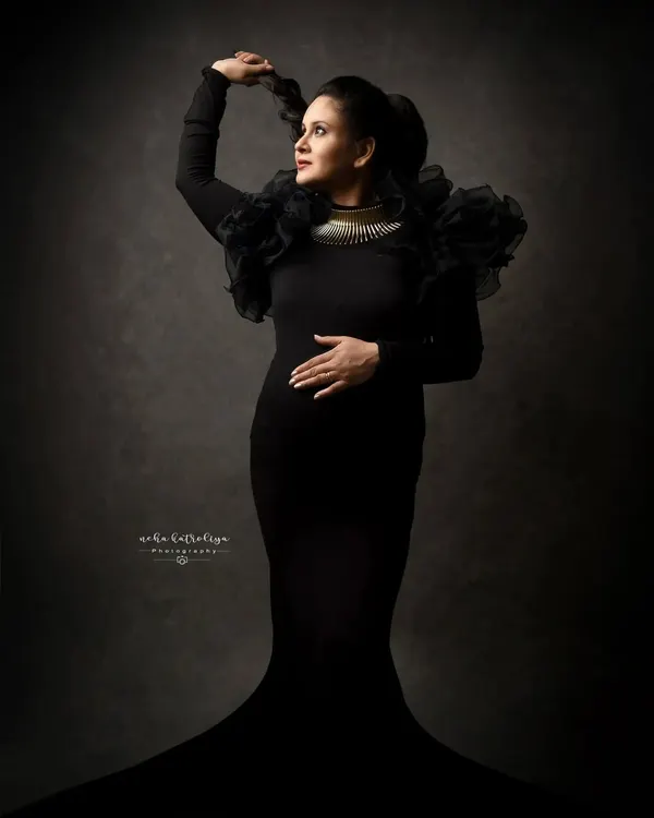 A self-portrait from my own maternity session. I love creating dramatic, fine-art images that tell a story of strength and magic.