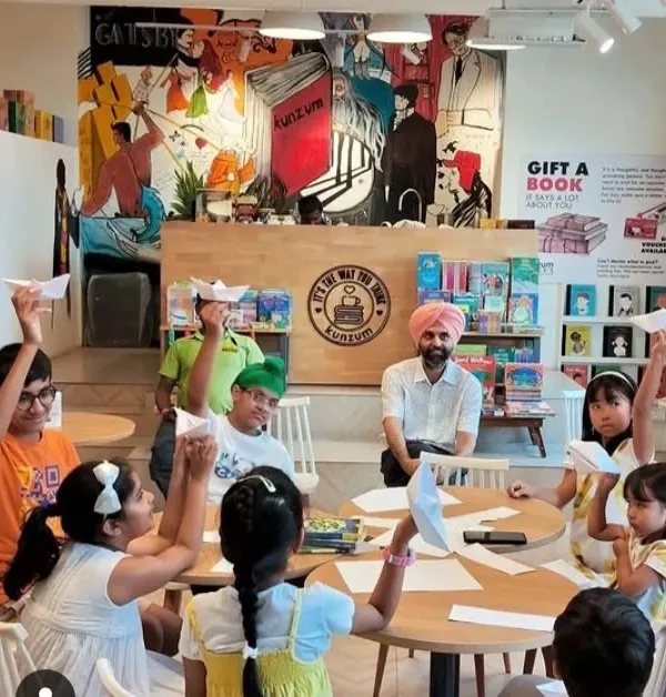 Welcome to our hive! This is what pure joy looks like. We believe in making learning a playful adventure, where kids can get creative, make friends, and let their imaginations fly, just like these paper airplanes.