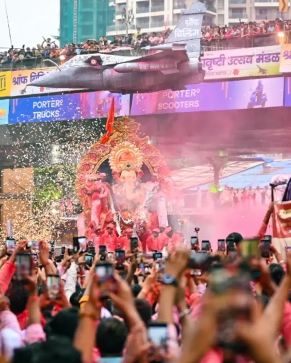 Capturing the grandeur of the Lalbaugcha Raja procession. This shot shows the massive crowd and the incredible energy of the Ganesh Chaturthi festival in Mumbai.