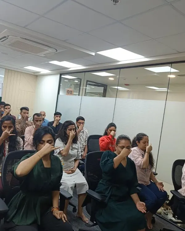Our instructors guiding employees at Exotel Techcom Pvt. Ltd. through Nadi Shodhana (Alternate Nostril Breathing). This simple desk-friendly practice is perfect for calming the mind and improving focus during a busy workday.