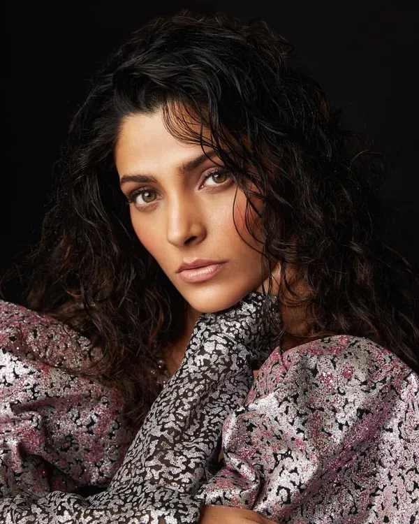For this Filmfare editorial with Saiyami Kher, I aimed for a powerful and intimate portrait. The focus is on the textured, metallic puff-sleeve top, which frames her face and adds a touch of dramatic flair, creating a look that is both bold and personal for the magazine feature.
