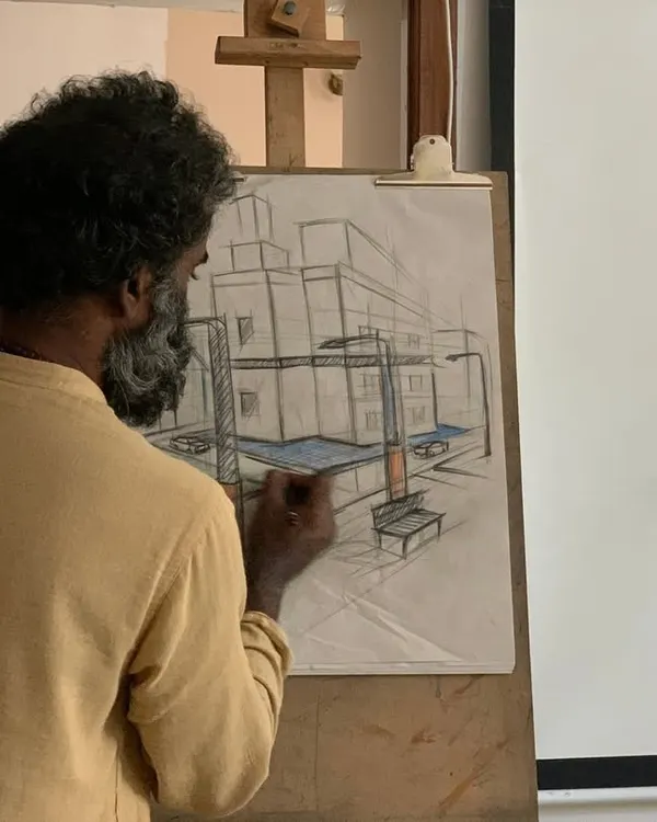 Here, one of our mentors demonstrates a two-point perspective drawing. Understanding perspective is a fundamental skill we teach to help students create drawings with realistic depth and structure.