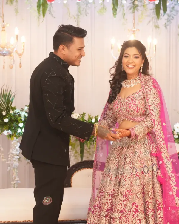 A beautiful, happy moment between the couple at their engagement. Her makeup is a perfect example of soft glam, with glowing skin and bright eyes that light up her face.
