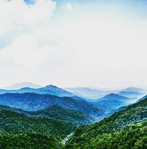 This is a view from near Dharmasthala, showing layers of green hills fading into the distance. I edited this landscape photo to bring out the vibrant greens and the soft blue tones of the mountains.