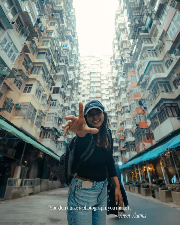 Here I am at the famous "Transformers building" in Hong Kong. For me, travel and photography are inseparable. This photo, with the quote from Ansel Adams, sums up my philosophy: "You don't take a photograph, you make it."