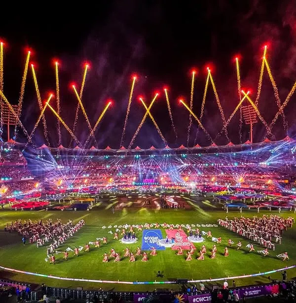 A bird's-eye view of the spectacle we created for the ICC Women's World Cup. This shot shows the full scale of our production, including the main stage, field performers, and the stadium-wide lighting and fireworks display we orchestrated.