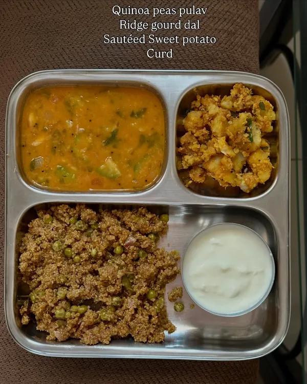 This plate of quinoa peas pulav, ridge gourd dal, sautéed sweet potato, and curd is a great example of a balanced meal. But remember, it's about progress, not perfection. One unbalanced meal won't ruin your health.