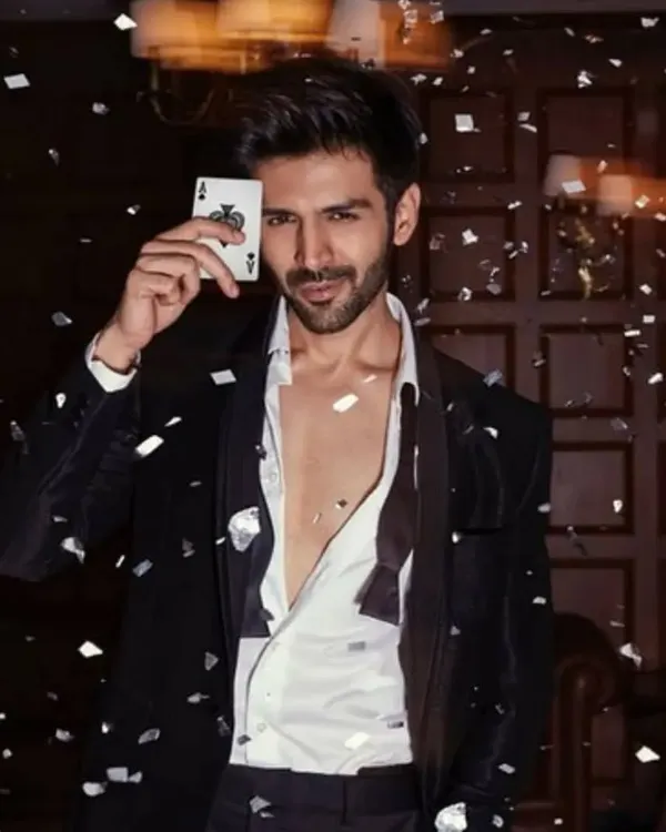 Styling Kartik Aaryan for this Bombay Times shoot was incredible. We created a "master of the game" look with a deconstructed tuxedo and falling confetti, perfect for his film 'Freddy'.