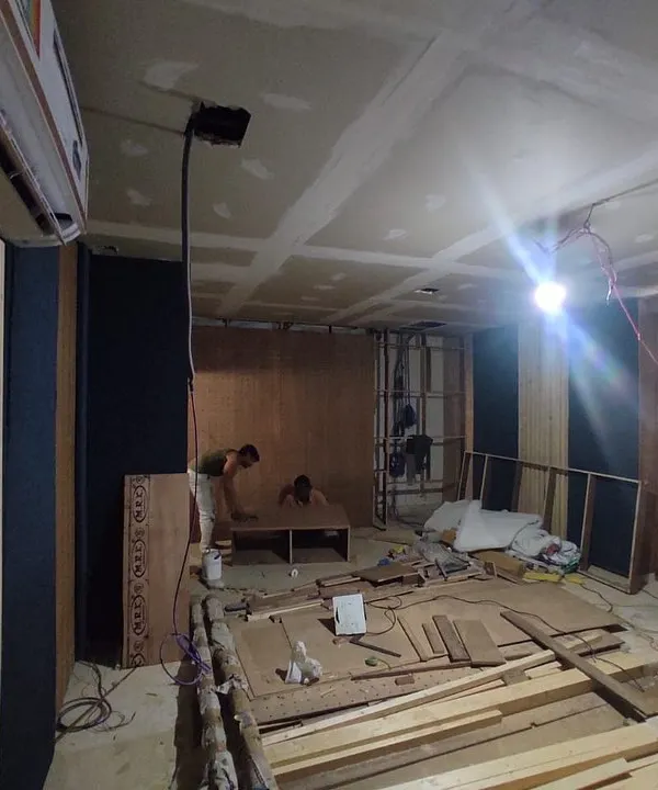 This is where it all begins. A behind-the-scenes look at a home theater during the construction phase, where we are installing the framework for the acoustic wall panels and running wiring for the audio-visual equipment.