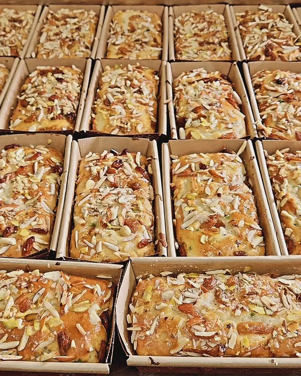 A fresh batch of our Almond Tea Cakes, ready for packing. These moist, flavorful cakes are loaded with almonds and are a perfect companion for your evening tea.