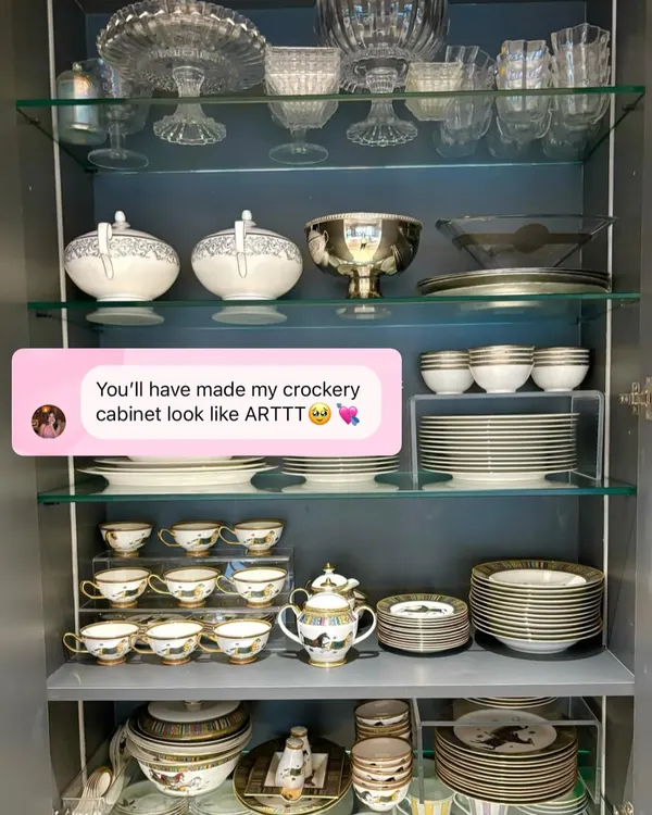 This client told us we made her crockery cabinet look like art, and that's exactly our goal. We use risers and careful stacking to create a display that is both beautiful and functional.