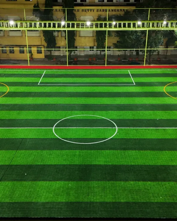 Our JP Nagar turf lit up and ready for an evening match. The high-quality artificial grass and clear markings provide a professional playing surface for football, box cricket, or even a game of frisbee.