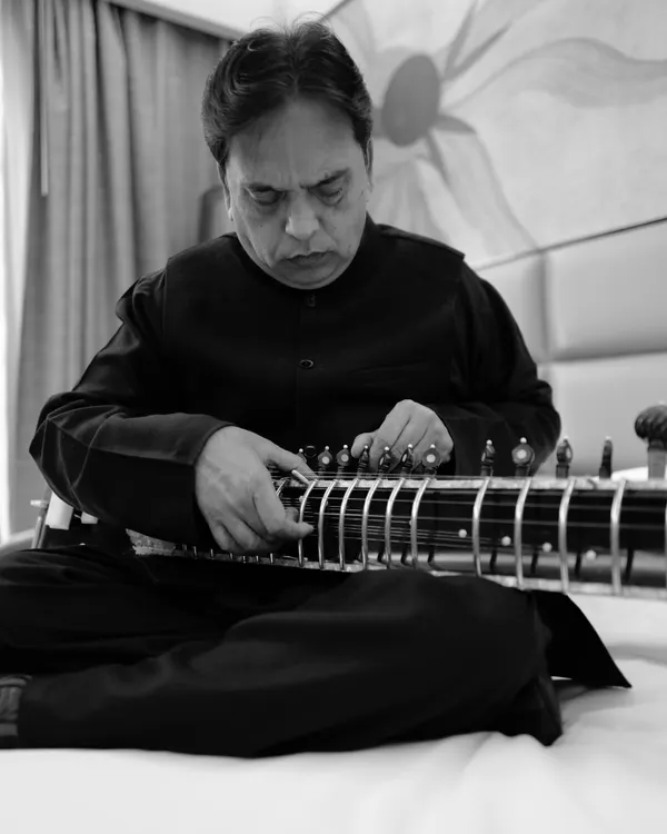 A black and white portrait of my beloved father and Ustad, Mohsin Ali Khan, tuning his sitar. Words will never be enough to express my gratitude for him.