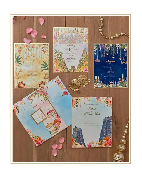 A riot of colors. We absolutely love the vibrancy of this invitation suite that we created to embody a truly South Indian spirit. The design features temple architecture, floral garlands, and a rich, celebratory color palette.