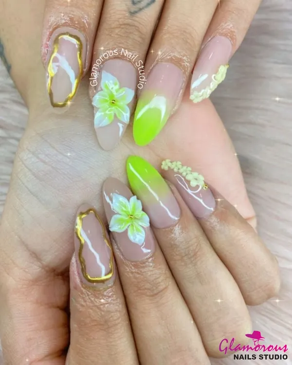 This is the kind of nail art we live for. We combined a nude base with a pop of neon green ombre, delicate 3D flowers, and elegant gold chrome detailing for a look that is both bold and beautiful. This is a perfect example of our custom gel nail extensions.