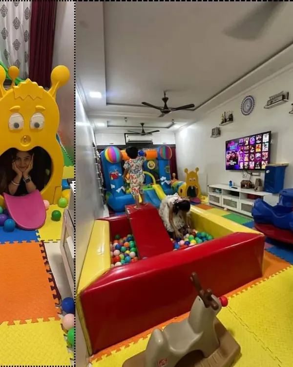A fantastic indoor setup in a client's home. This playzone features a large ball pit, a bouncy castle with a slide, and a caterpillar tunnel, showing how I can bring a full-scale play experience right into your living room.