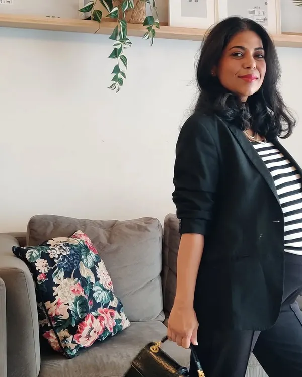 As a working mother, I understand the challenge of dressing a changing body with confidence. This is me styling my bump for a professional setting, proving that great style is possible at every stage of life.