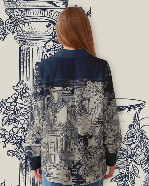 A mockup showing the back of a shirt featuring my 'Elysian Echo' print. The detailed, toile-like design with its Greek columns and botanicals creates an elegant and timeless piece of wearable art.