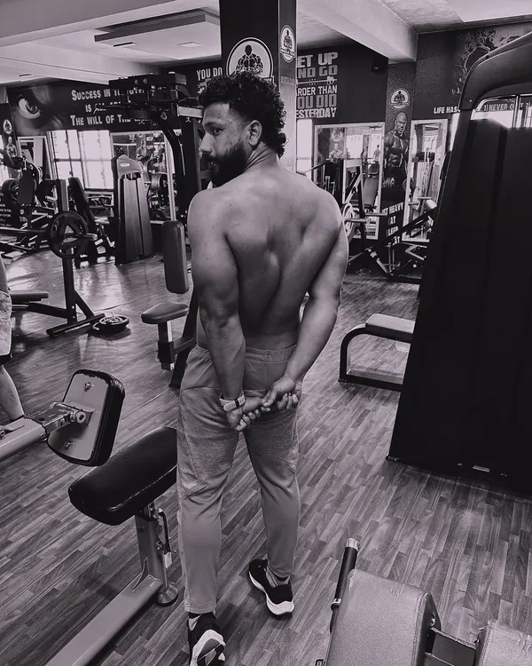 Don't be afraid to fail. This back pose shows the definition that comes from consistent training and discipline. My wrestling background taught me that every failure is a setup for a comeback.