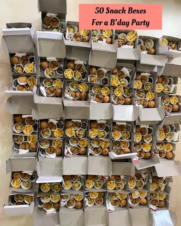 A large order of 50 snack boxes ready for a birthday party. It's a joy to see so many boxes of happiness going out from my kitchen.