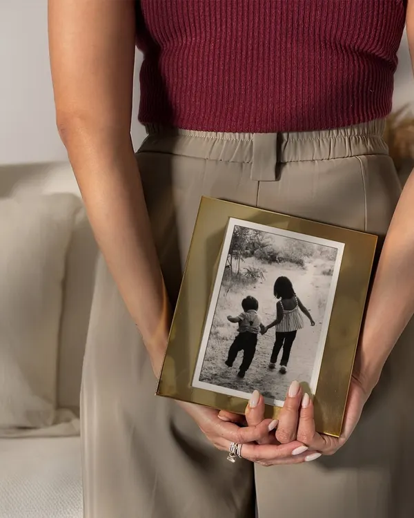 Some memories deserve more than just a place in your heart. I designed this simple, elegant brass photo frame to give your treasured moments the showcase they deserve.