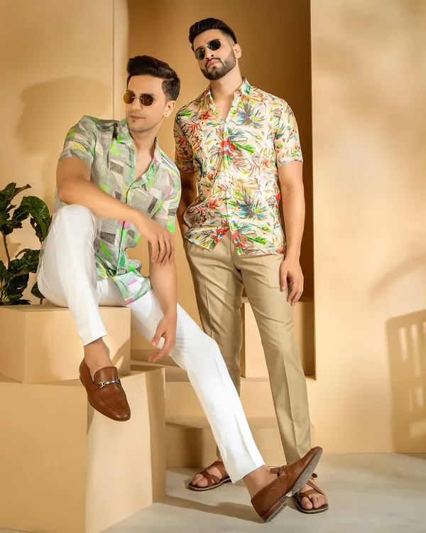 A styled studio shoot for a men's casual wear brand. The relaxed poses and warm lighting perfectly capture the laid-back vibe of the collection, making it ideal for social media and lookbooks.