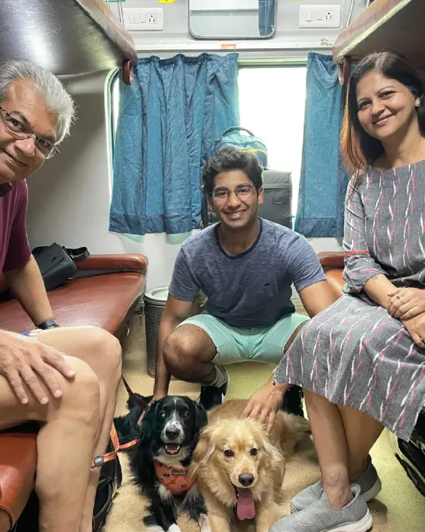 Relocating within India? I also arrange safe and comfortable pet travel by train. Here's a happy family with Gucci and Stocking in their own coupe on a journey from Howrah to Bengaluru, proving that no matter the distance, your family can always travel together.