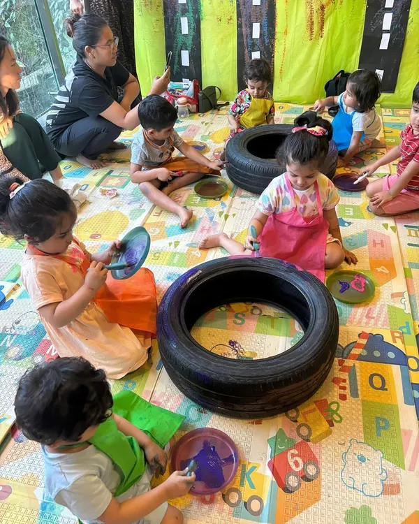 During Transport Week, we even painted with tires! The kids loved rolling toy tires in paint to create unique tracks and patterns on paper.