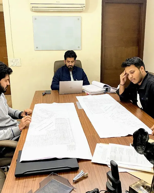 A typical Monday in the office, reviewing case files and blueprints with my team. Thorough preparation and collaborative strategy are the foundation of every case we handle, whether it's a construction dispute or a complex commercial matter.