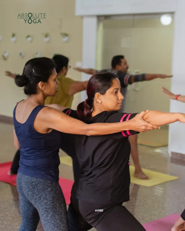 In my classes, you are never just a face in the crowd. I focus on providing hands on adjustments and verbal cues to ensure your alignment is safe and your practice is effective, even within a group setting.