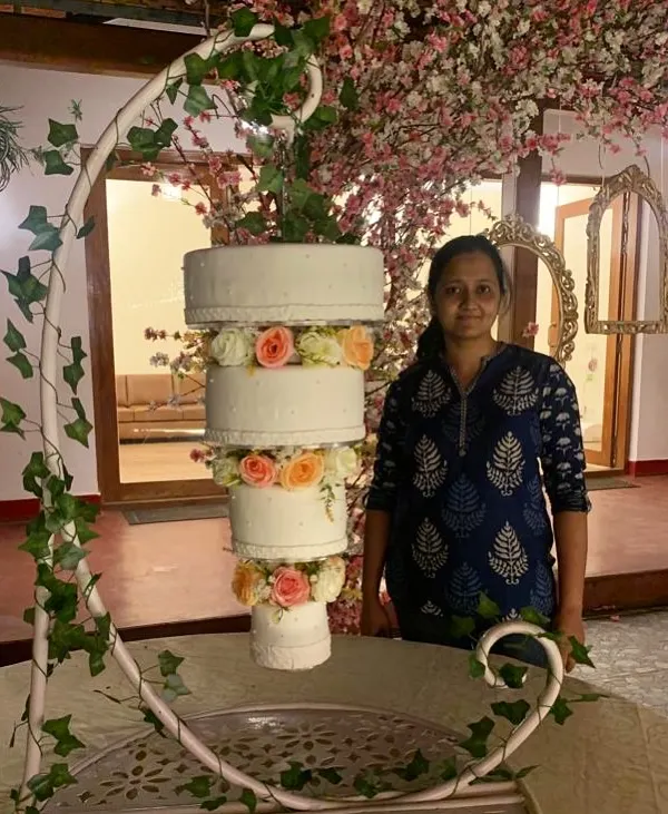 This was one of my most challenging and rewarding creations. A gravity-defying chandelier cake that served as the stunning centerpiece for a wedding. Each tier is carefully balanced to create a floating effect, adorned with delicate flowers.