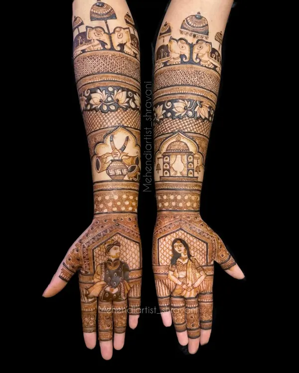 A full bridal mehendi telling a story. This design features detailed portraits of the bride and groom, surrounded by traditional motifs like elephants and a kalash, creating a complete narrative on the hands.
